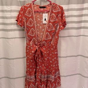 Orange wrap dress - size small